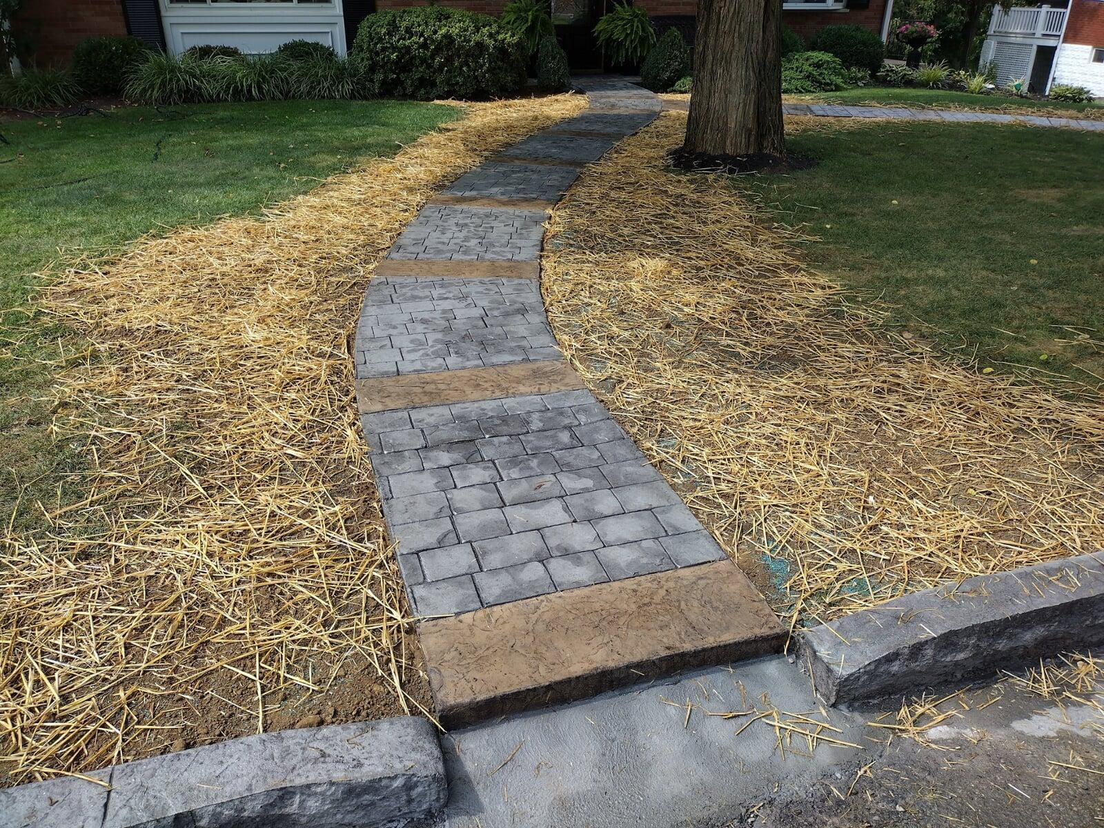 Concrete Cobblestone Sidewalk with Roman Slate