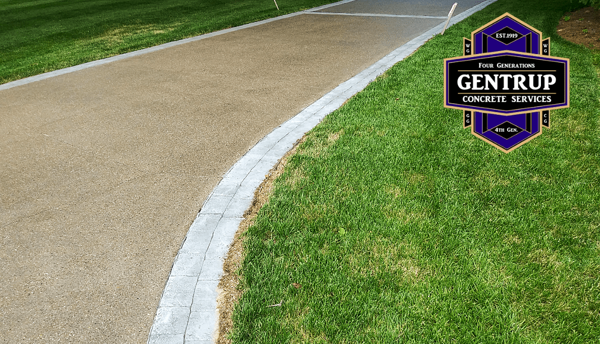 Exposed Aggregate Driveway with Stamped Concrete Borders 